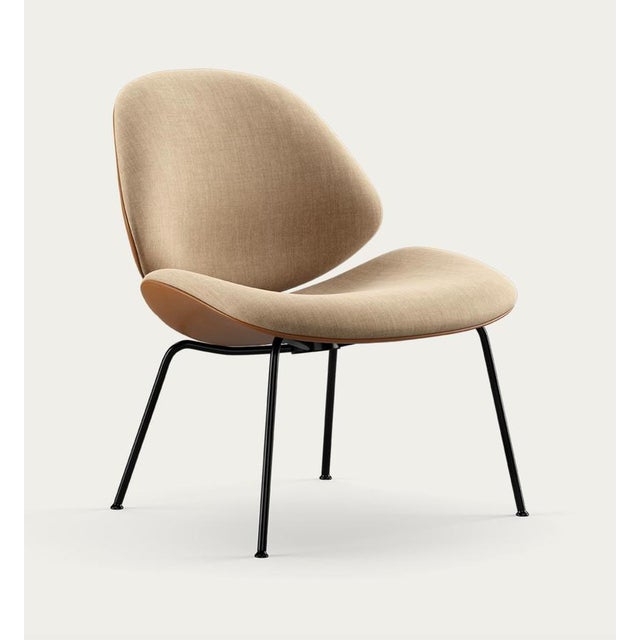 Salto and sigsgaard council family lounge chair legs: black, duo upholstery: front: front: remix 242 + back: nevada cognac...