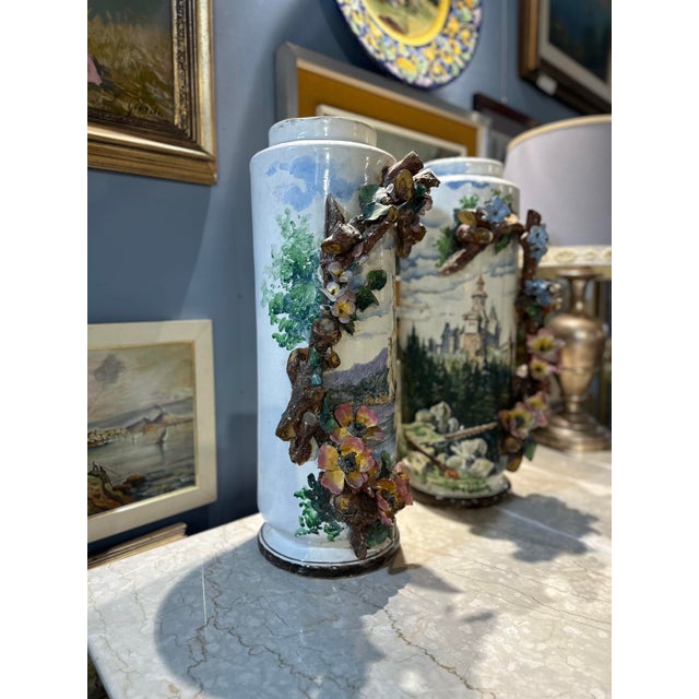 Pair of important ceramic vases hand-decorated with different scenes and applied flower shoots