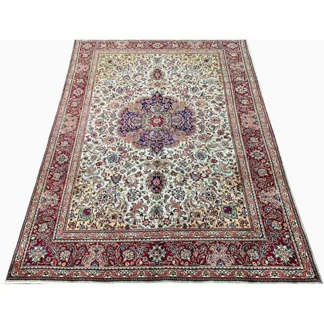 ACTUAL SIZE: 7’10” x 11’4″ PRIMARY COLOR: Green / Red AGE: Old MATERIALS: Wool & Silk FOUNDATION: Cotton PRODUCTION:...