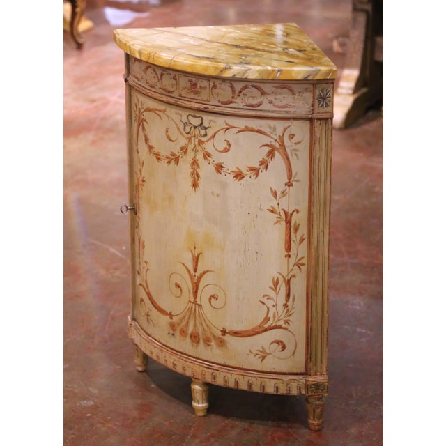 This elegant antique Venetian encoignure, crafted in Italy circa 1920, is designed in a rounded triangular form to nest...