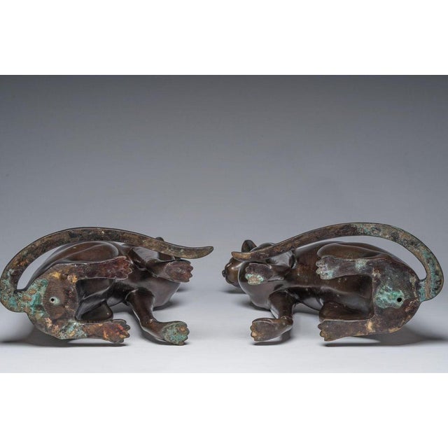 French Pair of Bronze Cats from the Egyptian Revival Art Deco Style, Signed A. Toit, circa 1970 A magnificent pair of...