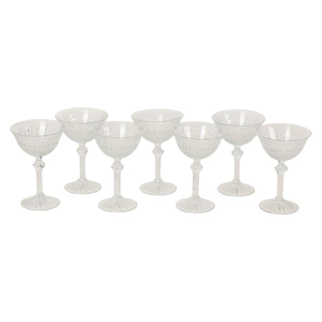 Set of 7 crystal champagne glasses manufactured by Fidenza Vetraria (model: Regency Coppa, 210cc), Italy, 1980s. The set...