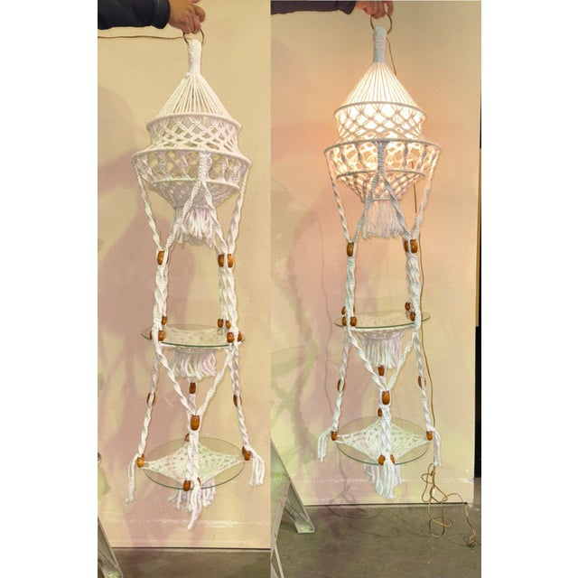 Authentic vintage 1970s macramé swag lamp with integrated glass shelving. A large-scale bohemian statement piece measuring...