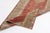 This is a vintage Turkish Oushak rug from the Mid 20th Century. The piece was hand-knotted.