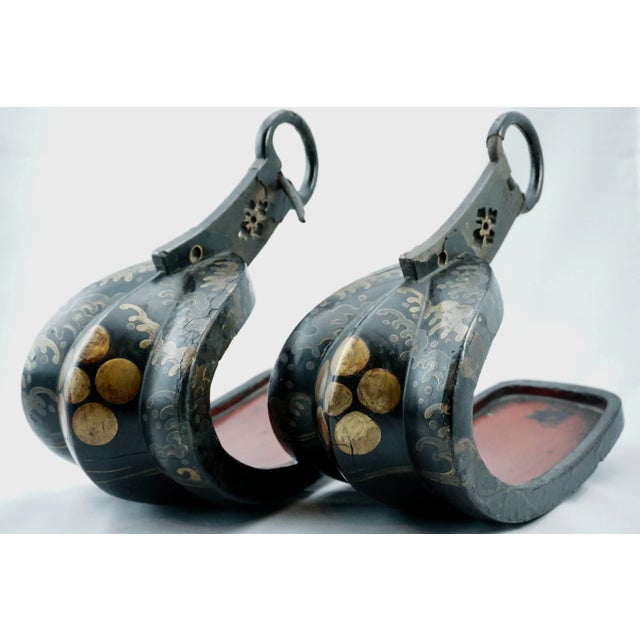18th century Japanese Edo period Lacquered Samouri Iron stirups with original wooden lacquered insoles. Truly a beautiful...