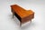 A sculptural boomerang-shaped writing desk designed by Peter Løvig Nielsen and produced by Løvig in Denmark during the...