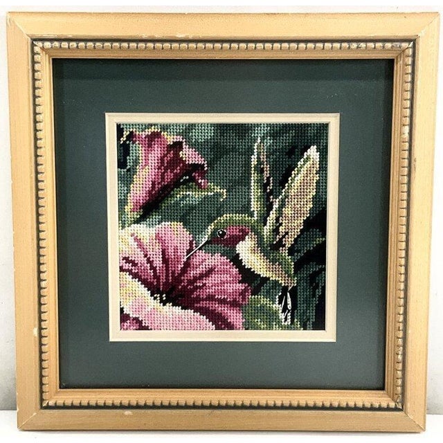 Bring a touch of vintage charm to your walls with this exquisitely detailed hummingbird needlepoint. Featuring a vibrant...