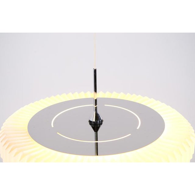 Sunflower pendant, model 190, designed by philip bro ludvigsen for le klint. The lamp is inspired by the shape of a...