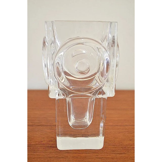 Swedish disc vase designed by Bengt Edenfalk for the Swedish glass manufacturer Skruf. Signed in the ground with Edenfalk....