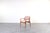 This teak armchair model "Ella" was designed in the 1960s by Arne Vodder and manufactured by the renowned Danish company...