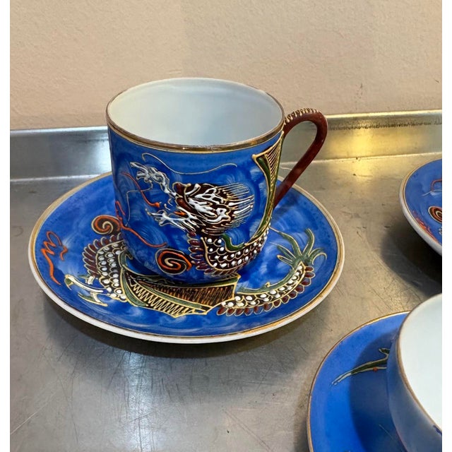 Moriage Dragonware hand-painted Japanese porcelain demitasse cup/saucer and 2 teacups w/ saucers. Excellent condition....