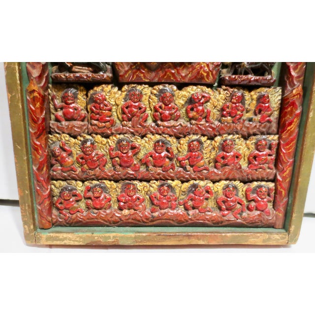 Tibetan Votive Panel of Begtse Polychromed Carved Wood. Unusual wood carving with polychrome, created to honor the...