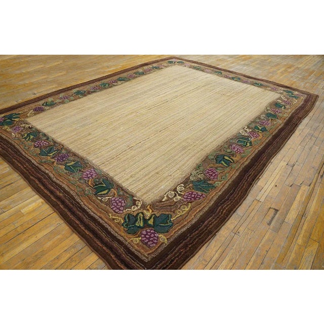 Antique American Hooked rug. Measures: 8'8"x11'8".