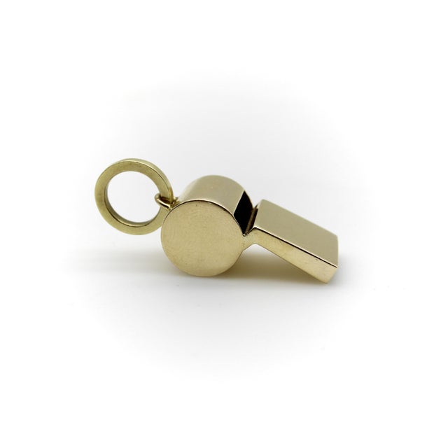 The whistle charms serves as both an iconic piece of jewelry and also a useful call to action. This 18k gold version has a...