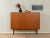 Classic highboard from the 1950s. High quality body in teak veneer with four closet doors, four shelves and new square...