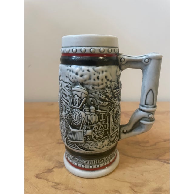 A fantastic, highly detailed 3-piece vintage ceramic barware collection. The center piece is an authentic vintage Avon...