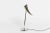 The lamp Ara was designed by Philippe Starck in 1988 and bears the name of his daughter. The lamp was made by Flos in...