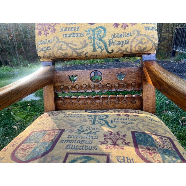 Arts and Crafts/Craftmans style side chair made from oak with upholstered back and seat. Carvings, cut outs and nailhead...