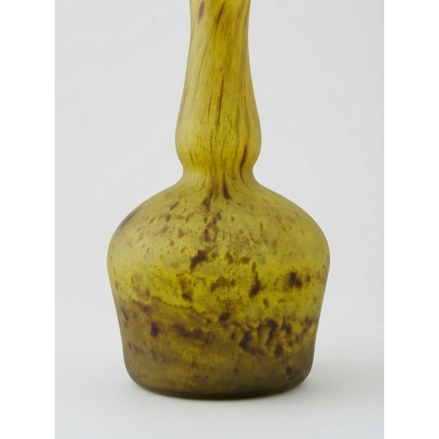 A rare, large Le Lorrain soliflore vase, in the Berluze shape, crafted from polychrome marbled glass in shades of golden...