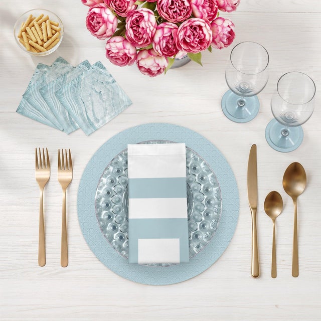 Embracing a minimalist aesthetic through its solid color pattern, this Solid Round Cane Placemat celebrates the beauty of...