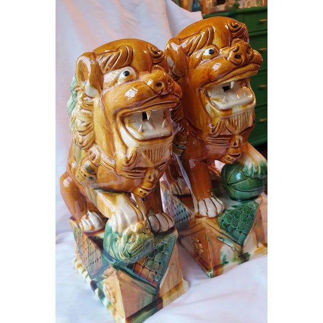 Fantastic pair of Majolica style Foo Dogs will add personality to any room! Substantial size would make them excellent...