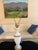 Magnificent, tall Mid-Century frosted glass table lamps. The classically designed lamps feature a flaring neck above a...