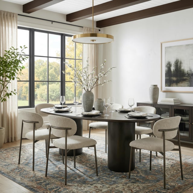 Elevate your space with the Butler Specialty Company Kersten 84" Oval Wood Dining Table, a stunning statement piece that...