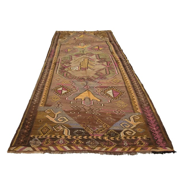 Handwoven vintage kilim rug from Kars region of Turkey. Approximately 50-60 years old. In very good condition.