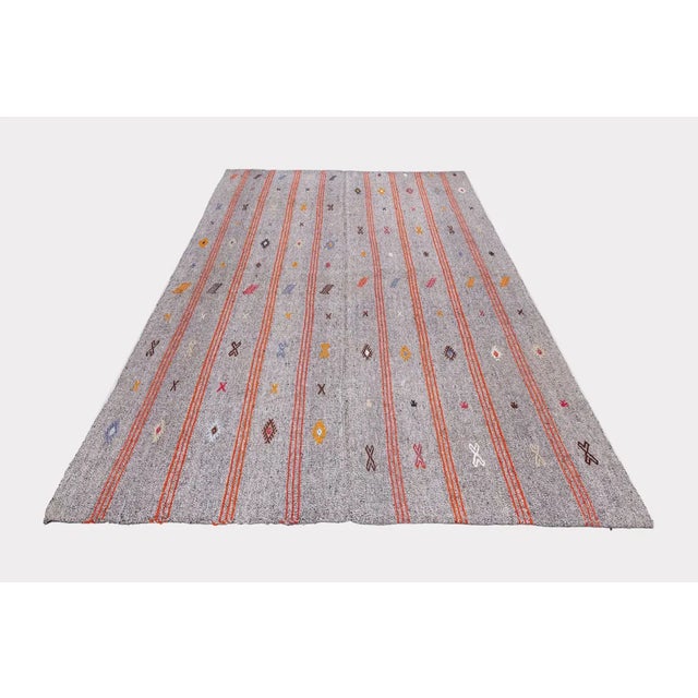 This is a Tribal Pala Kelim handmade in 1960s in the traditional flatweave style and motif of nomadic tribes of Turkey. It...