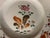 Antique 18th century Chinese export porcelain plate. Decorated in famille rose palette with . Measures 9" diameter. Good...