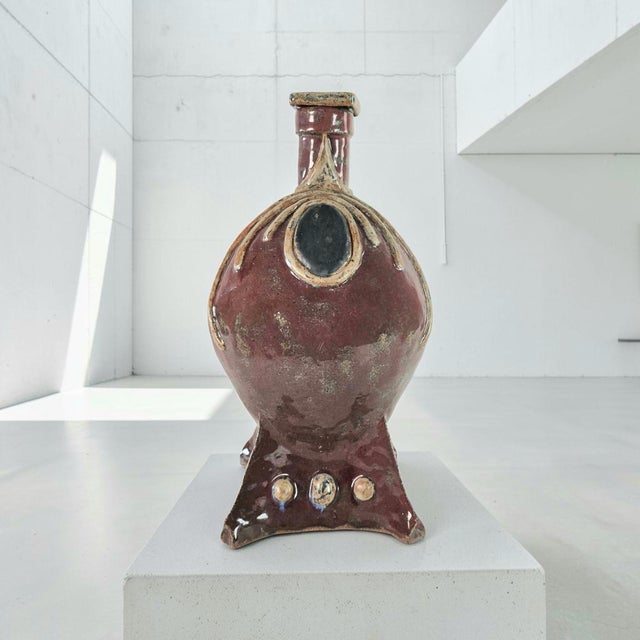 A substantial mid-twentieth-century American studio pottery lidded vessel with a strongly sculptural Modernist presence....