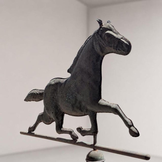 An important copper weathervane from the early 1900s, featuring a three-dimensional composition depicting a running horse....