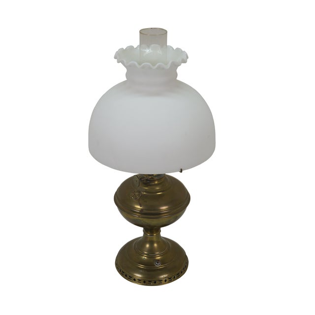 Early 20th century Mantle Lamp company Aladdin brass oil lamp with hurricane and matte milk glass shade with ruffled top....