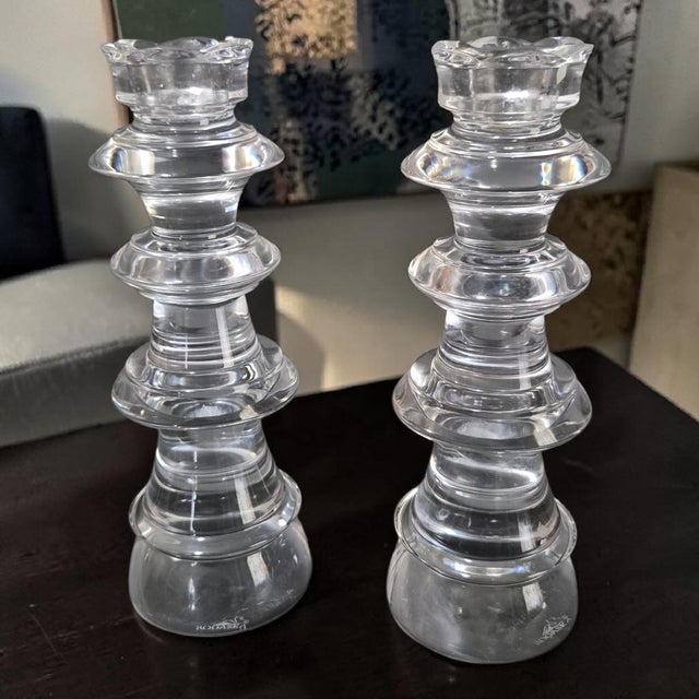 These vintage crystal candle holders feature a stunning geometric tower design, perfect for adding an elegant touch to any...