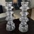 These vintage crystal candle holders feature a stunning geometric tower design, perfect for adding an elegant touch to any...