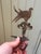 Exceptional early forged iron wall hook featuring a stylized bird finial and beautifully executed hand-forged scrollwork,...
