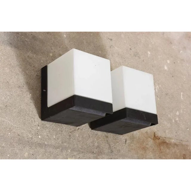 Exceptional constructivist design in Bauhaus style. Opaline glass in a mold formed with a bakelite suspension, labeled...