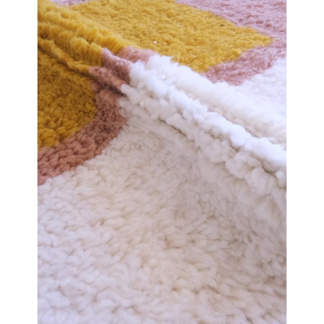 Elevate your home decor with our Moroccan Handknotted Contemporary Rug. Measuring 6 x 3.2 ft, this fairtrade rug adds a...