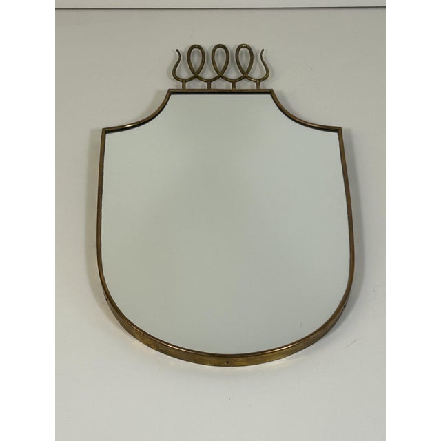 The mirror is stylistically attributed to the extraordinary Milanese designer. This piece is attributed to the mentioned...