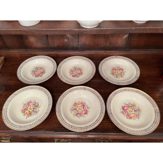 Offered is a lovely vintage set of bowls by The Edwin M Knowles China Co. This set features a floral design with 22 karat...