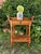 An elegant antique nineteenth-century washstand featuring a shaped wooden gallery with distinctive scrolling side...