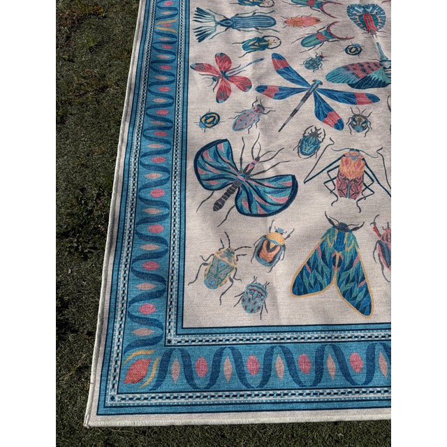 Design Plus Gallery presents the 6ft x 9ft Fluttery Area Rug by Iris Apfel for Ruggable. The Iris Apfel Flutterby Rug by...
