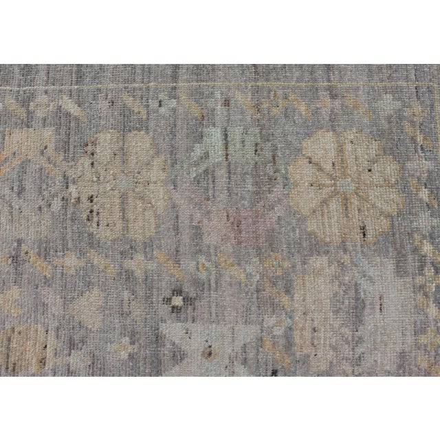 Textile Tribal Motif Designed Rug in Muted Tones and a Gray Background by Keivan Woven Arts For Sale - Image 7 of 12