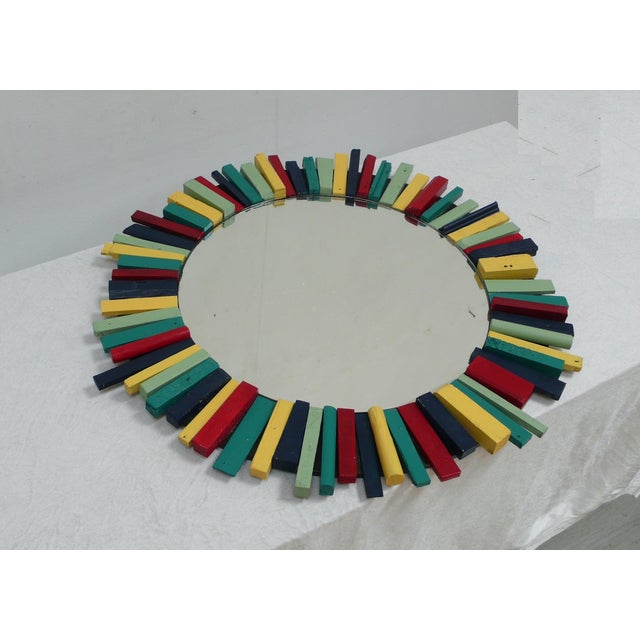 Round wall mirror, unique piece Wooden frame, upcycled project made from wood scraps with colorful earth tones. The mirror...
