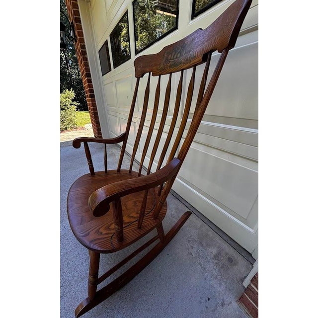 Charming, comfortable Hitchcock oak rocking chair. Purchased in Hitchcocksville (now Riverton) CT from the revived...