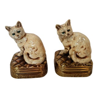 1930s Marion Bronze "Kitten on Hassock" White Cat Bookends - a Pair For Sale