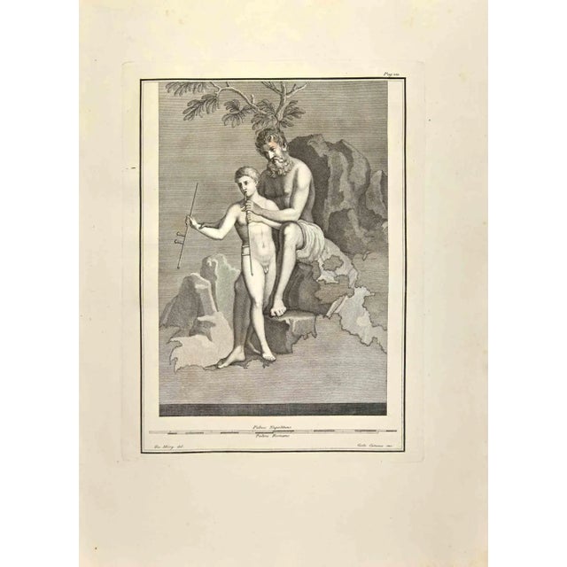 Pan Teaching Daphnis To Play from "Antiquities of Herculaneum" is an etching on paper realized by Carlo Cataneo in the...