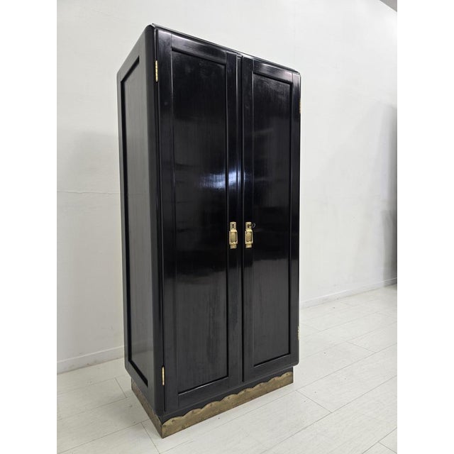 This wardrobe was produced in Vienna around 1940 and reflects the transition from late Art Deco to early modernist design....