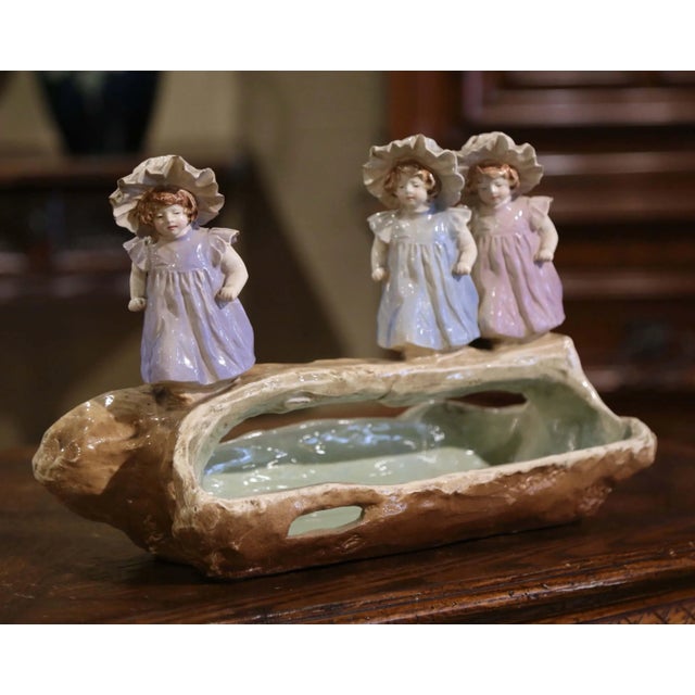 Bring whimsical charm and color to a dining table, console, or mantel with this delightful antique French barbotine...