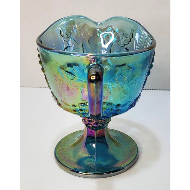 Pattern: Harvest Grape Color: Blue Carnival Manufacturer: Indiana Glass Company Date Produced: 1970s Shape: Creamer